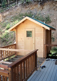 finished outdoors sauna kit manufactured by bavariancottages.com and installed in Wyoming USA